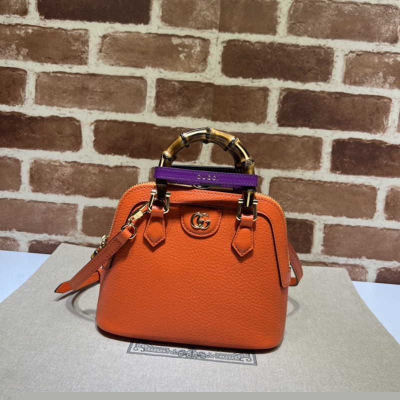 G*u*i top handle bags